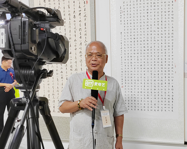 央广文旅发展中心副理事长、中国楹联学会书法艺术研究会常务理事林文亮展览现场接受媒体采访.jpg