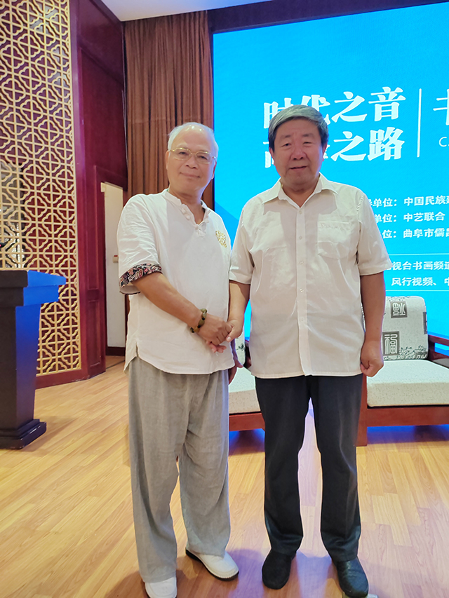 央广文旅发展中心副理事长、中国楹联学会书法艺术研究会常务理事林文亮 与国家文物局原党组书记、副局长张柏合影.jpg